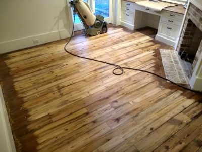 Putting a custom blended stain on these beautiful antique heart pine floors on S...
