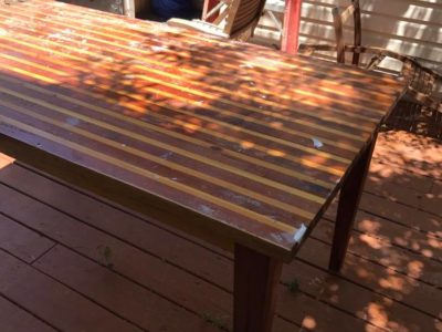 Refinishing a table that a client's grandfather had made for them. Cedar and Pop...